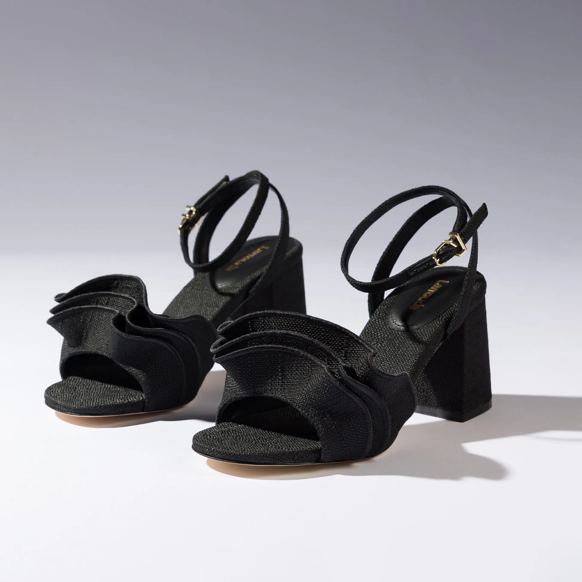 Selena Ruffle Sandal In Black Raffia